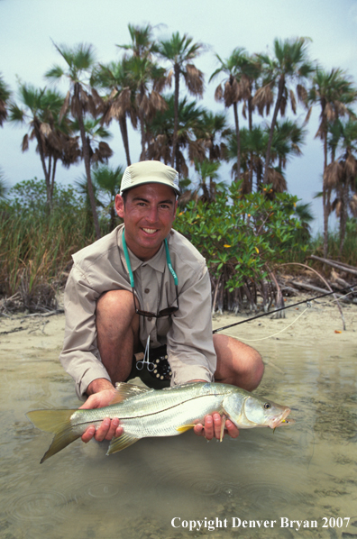 Saltwater flyfisher with snook.