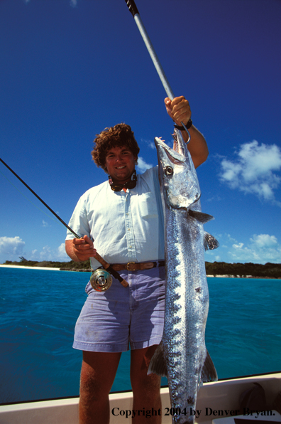 Saltwater flyfisherman with barracuda.