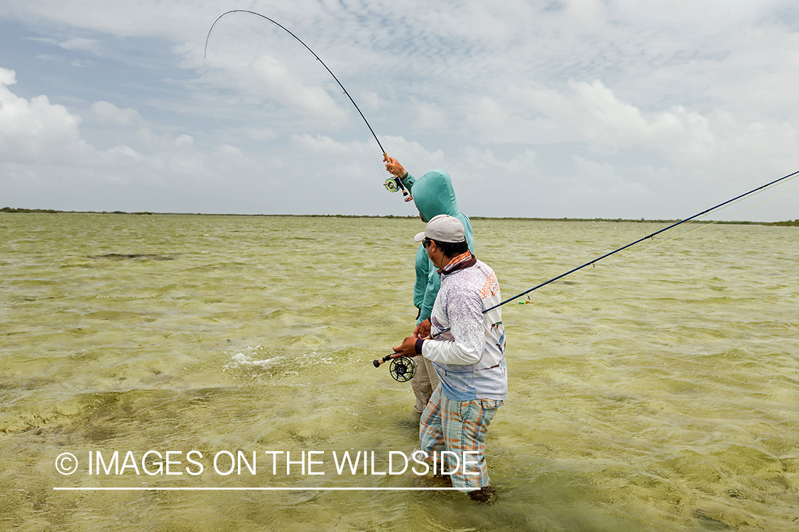 Flyfisherman and guide flyfishing for Bonefish and Permit.