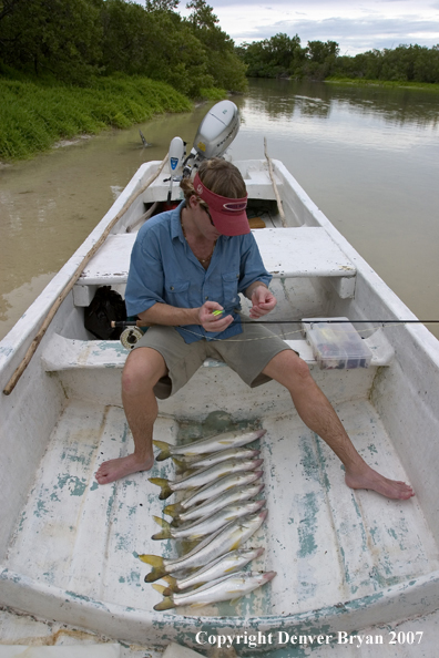 Flyfisherman w/snook catch in the boat