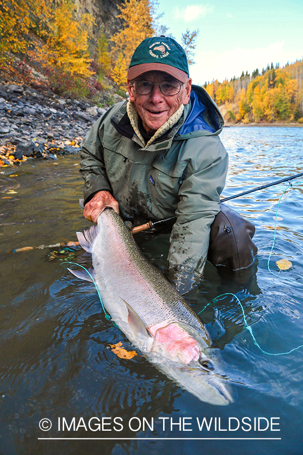 Flyfisherman with steelhead.