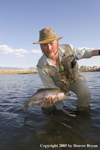 Flyfisherman with Rainbow Trout, Rocky Mountains