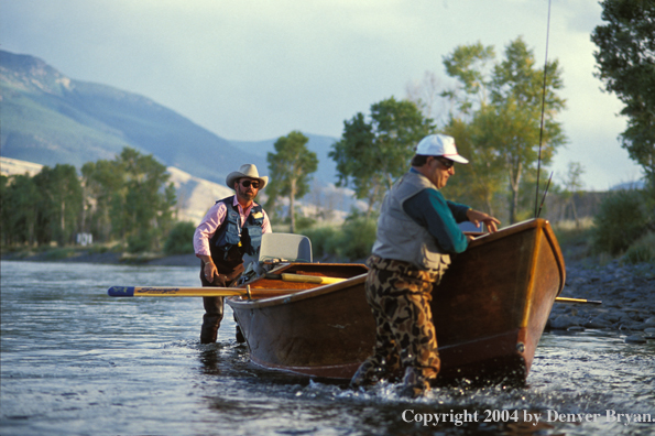 Flyfishermen with driftboat.