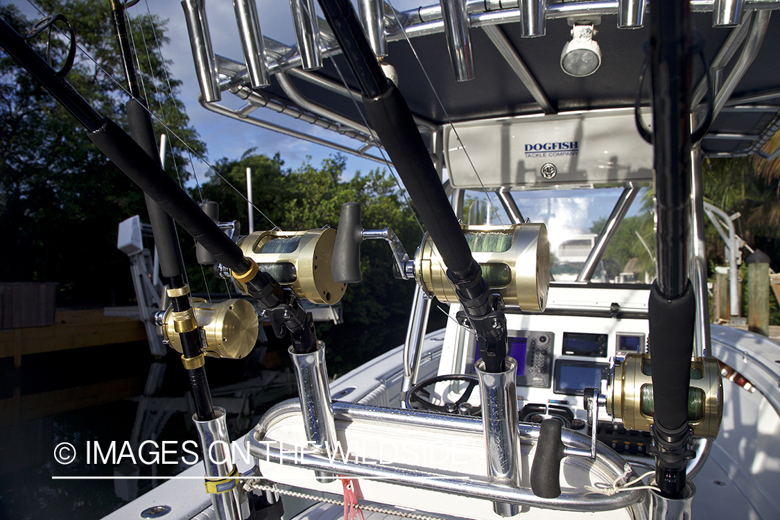 Deep sea fishing rod and reels on boat.