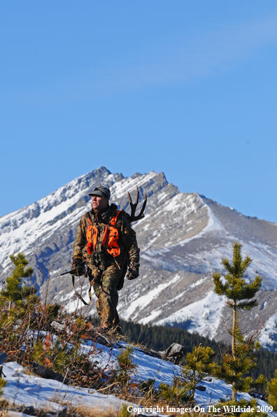 Hunter with deer rack