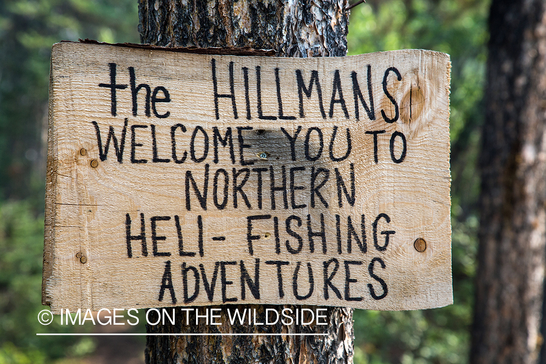 Heli-fishing sign on Nakina River, British Columbia.