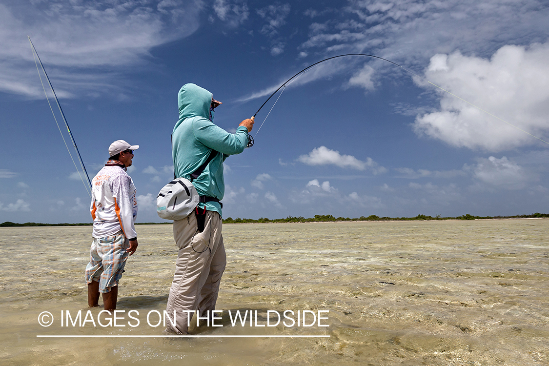 Flyfisherman and guide flyfishing for Bonefish and Permit.