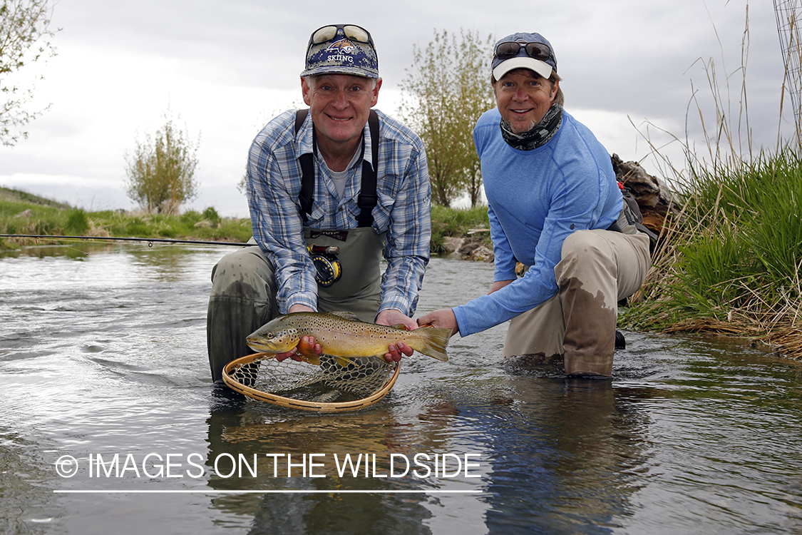 Flyfishermen with Brown Trout.