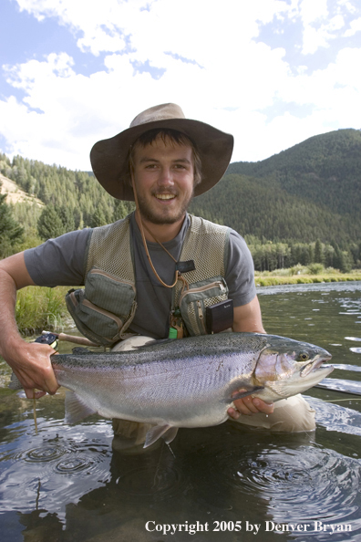 Flyfisherman with Rainbow Trout, Rocky Mountains