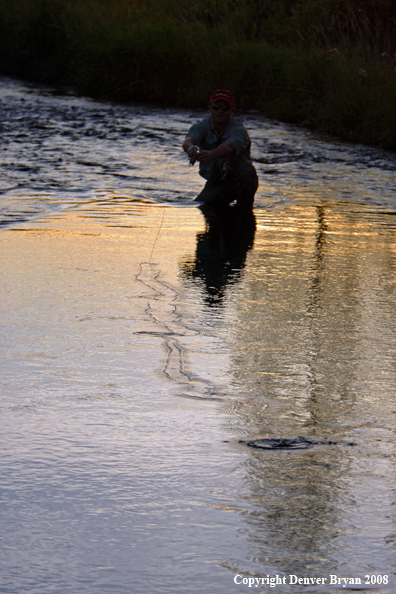 Flyfisherman casting line