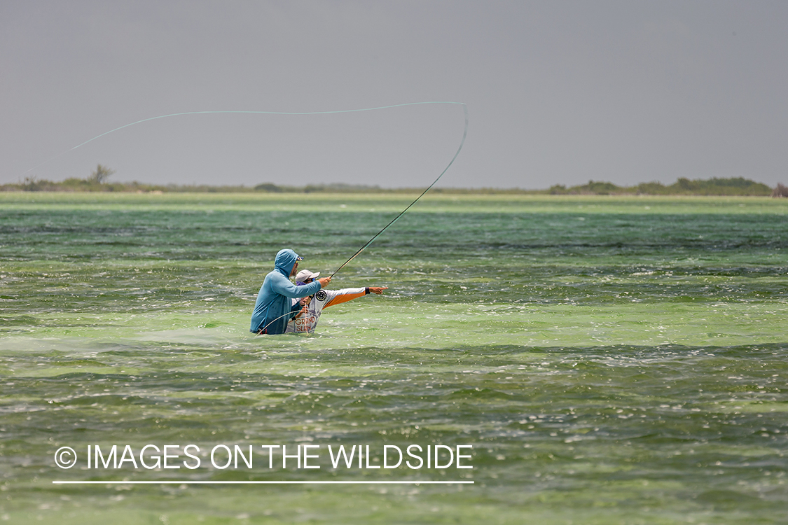 Flyfisherman and guide flyfishing for Bonefish and Permit.