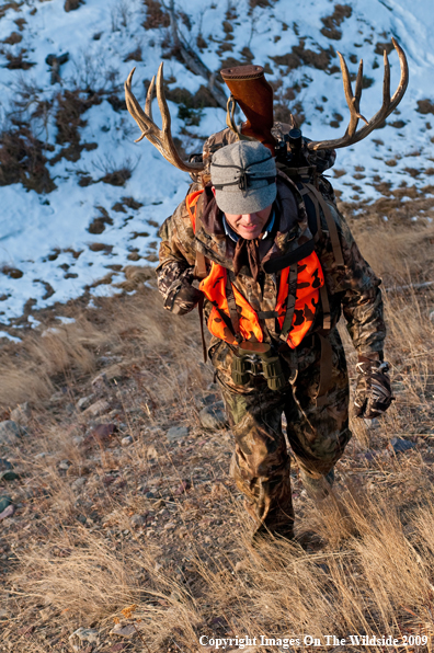 Hunter with deer rack