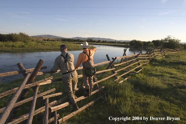 Flyfisherman scouting river.