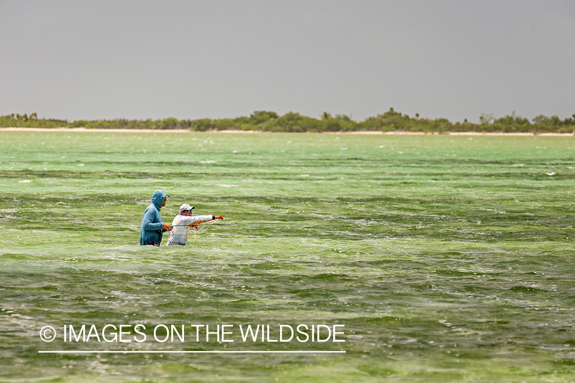 Flyfisherman and guide flyfishing for Bonefish and Permit.