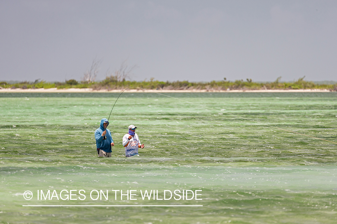 Flyfisherman and guide flyfishing for Bonefish and Permit.