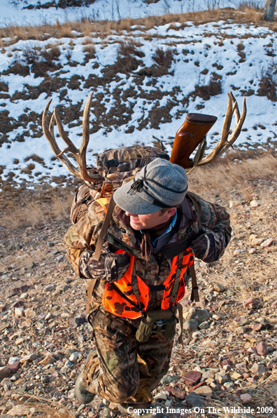 Hunter with deer rack