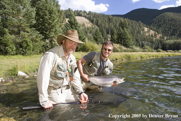 Flyfisherman and father with Rainbow Trout, Rocky Mountains