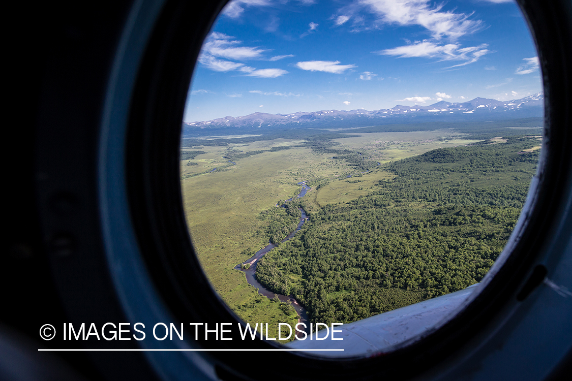 View from Russian helicopter flying over Kamchatka Peninsula, Russia.
