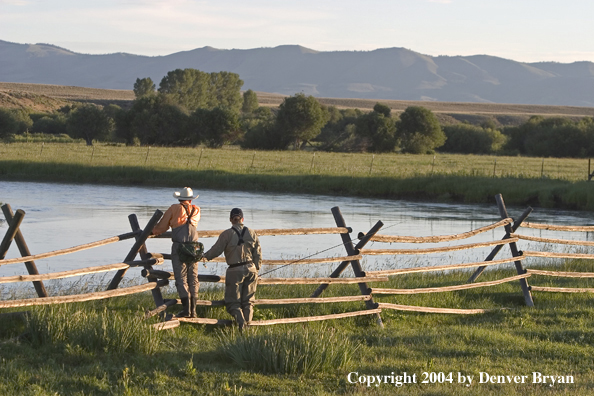 Flyfisherman scouting river.