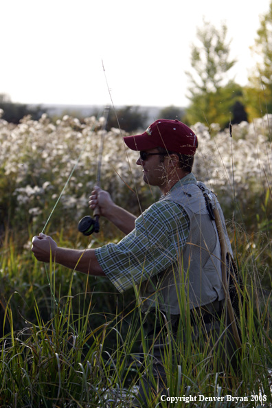 Flyfisherman in stream