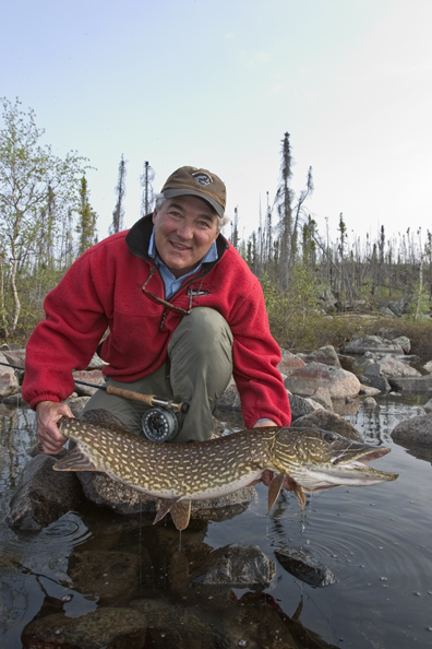 Flyfisherman with Northern pike (MR)