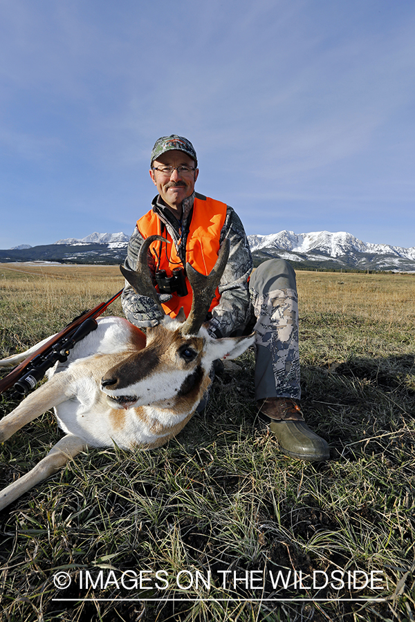 Pronghorn Antelope hunter with bagged antelope buck.