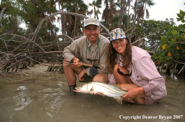 Saltwater flyfishers with snook.