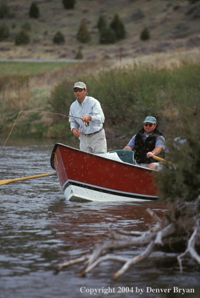 Flyfisherman fishing from driftboat.