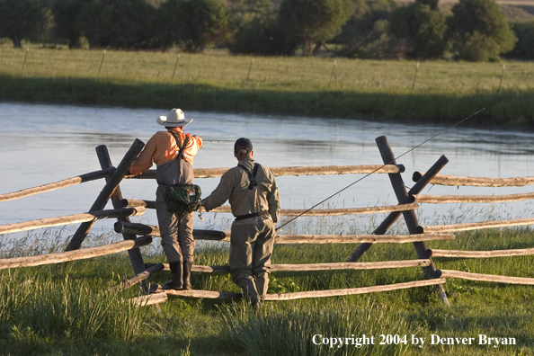 Flyfisherman scouting river.