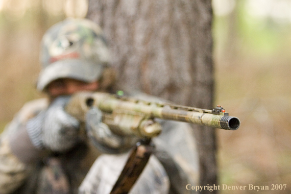 Turkey hunter aiming