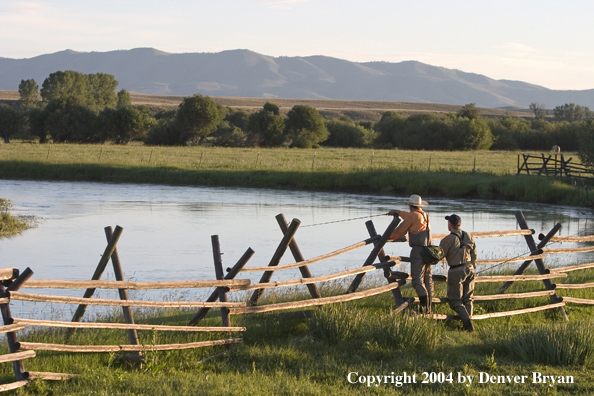 Flyfisherman scouting river.