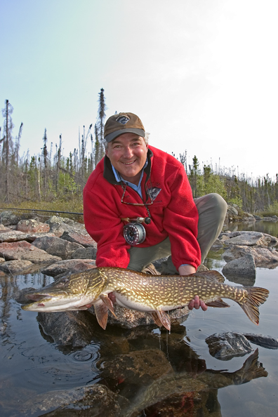 Flyfisherman with Northern pike (MR)