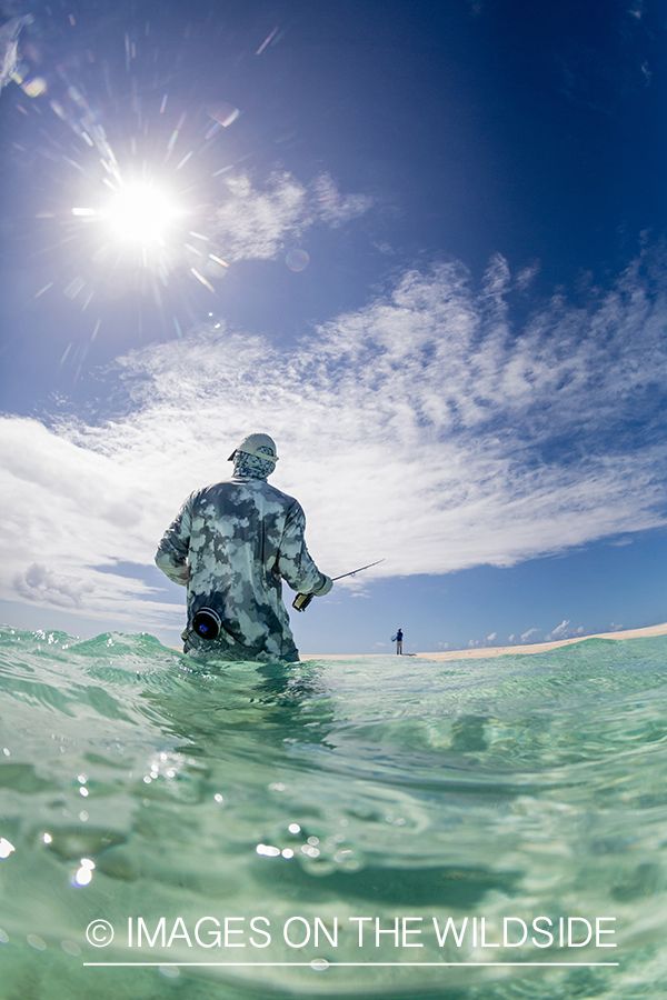 Flyfisherman on St. Brandon's Atoll flats, Indian Ocean.