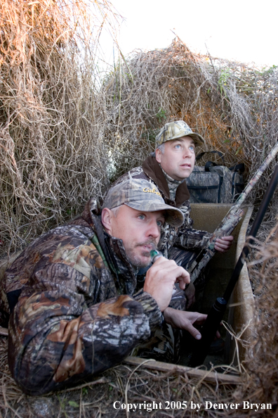 Duck hunters in blind.