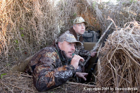 Duck hunters in blind.