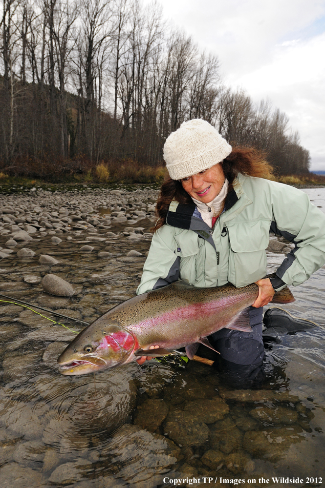 Fisherwoman with Steelhead Trout. 