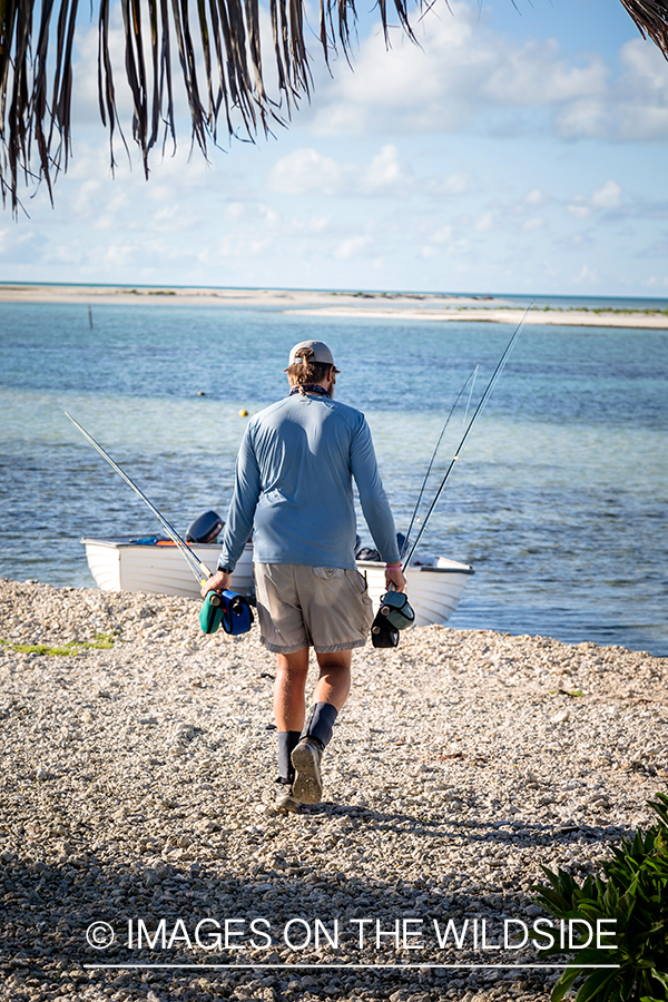 Flyfisherman on St. Brandon's Atoll flats, Indian Ocean.
