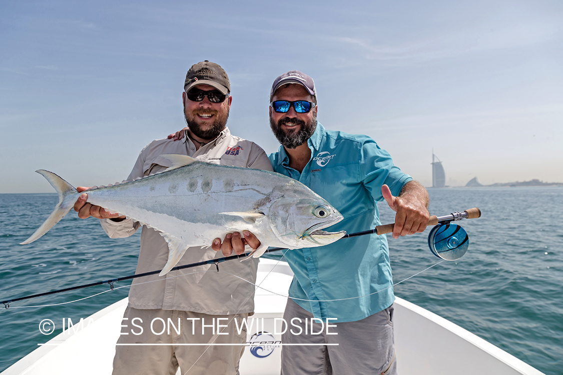 Flyfishing for queenfish off the coast of Dubai, UAE.