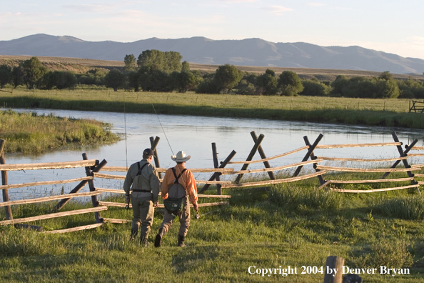 Flyfisherman scouting river.