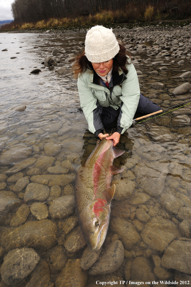 Fisherwoman with Steelhead Trout. 