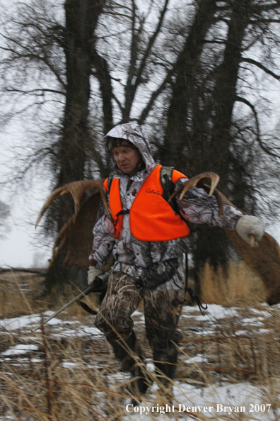 Moose hunter in field