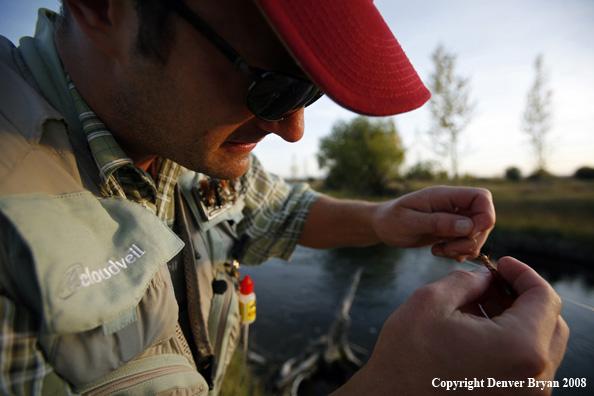 Flyfisherman with fly