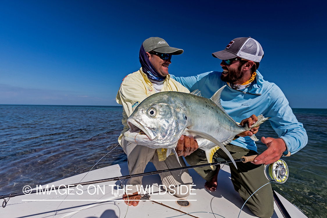 Flyfisherman with jack crevalle.