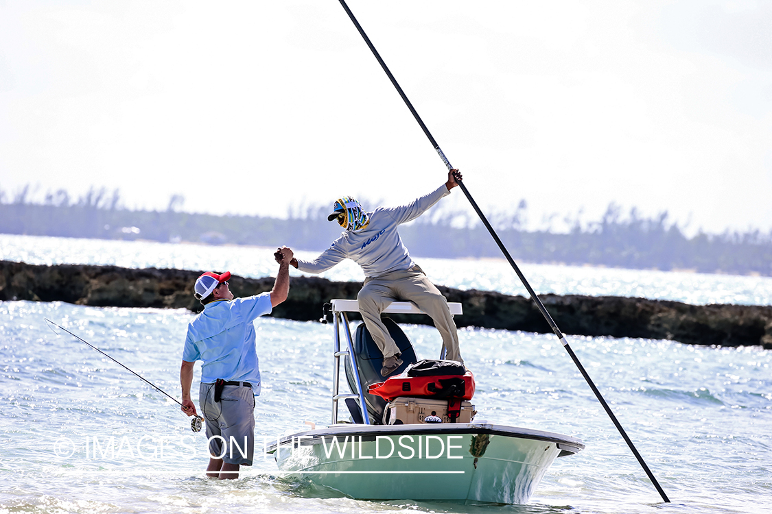 Flyfishermen with boat.