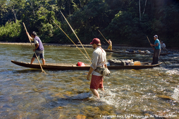 Flyfishermen walking upstream