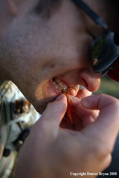 Flyfisherman with fly