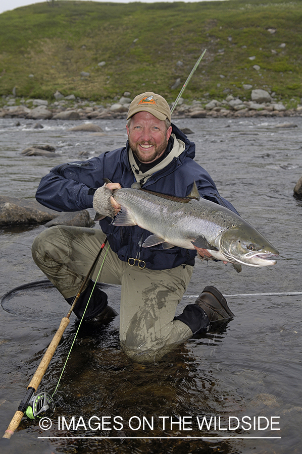 Flyfisherman with salmon.