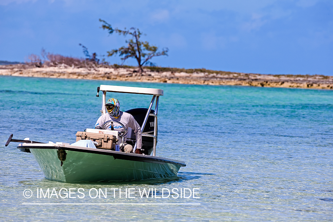 Flyfisherman on boat.