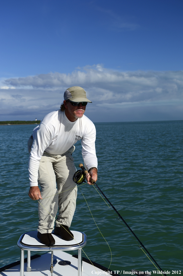 Flyfisherman casting. 