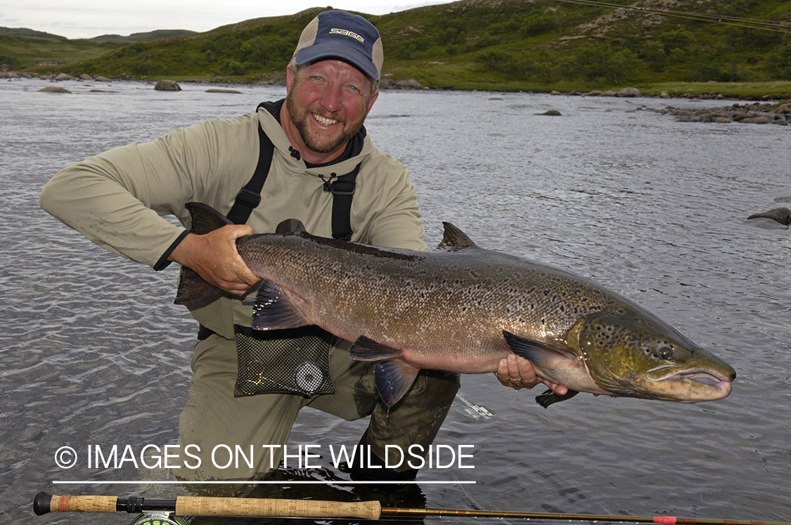 Flyfisherman with salmon.